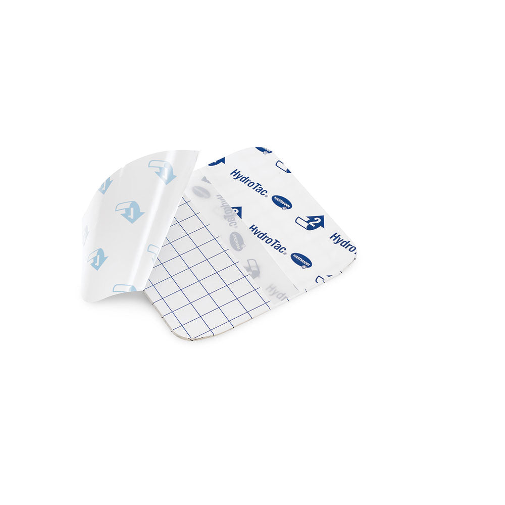 Hydrogelverband HydroTac transparent, gefalteter Verband mit Markenaufdruck auf weißem Träger