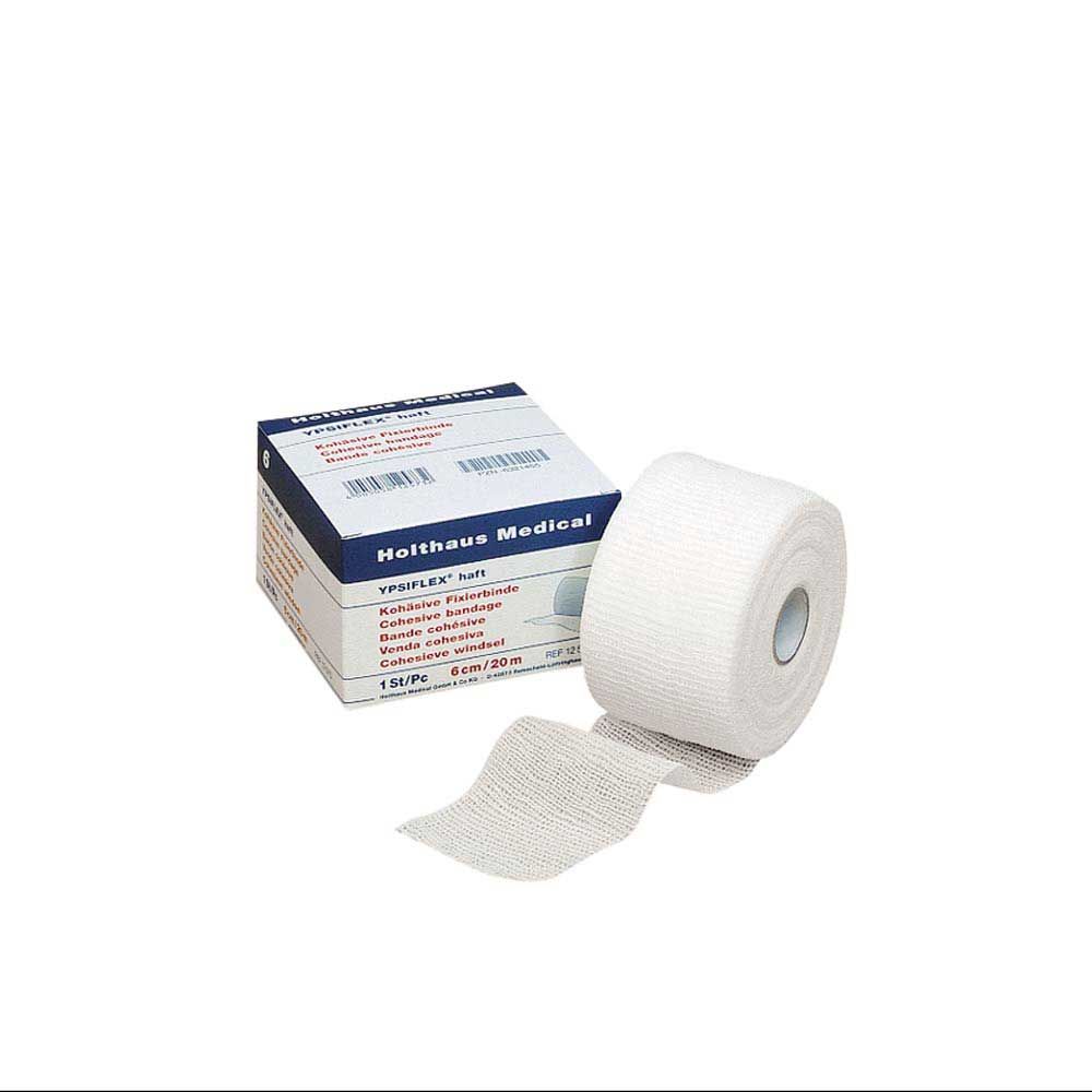 Haft-Mullbinde YPSIFLEX® haftend auf Rolle, hellgraues Mullgewebe, Verpackung sichtbar