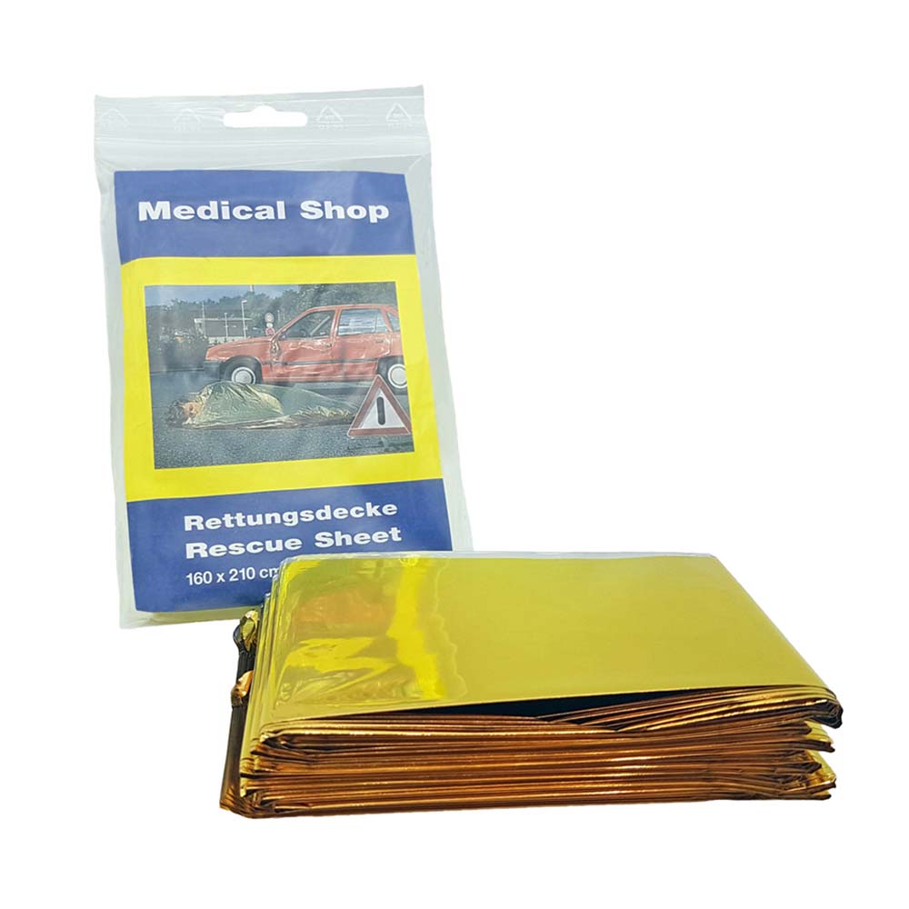 Gefaltete Rettungsdecke, glänzende Goldseite, im Stapel