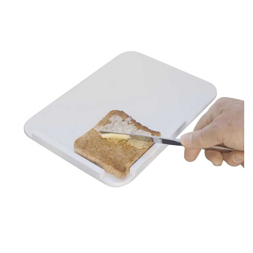 Brotschmierbrett aus Kunststoff, glatte Oberfläche mit Brot und Buttermesser